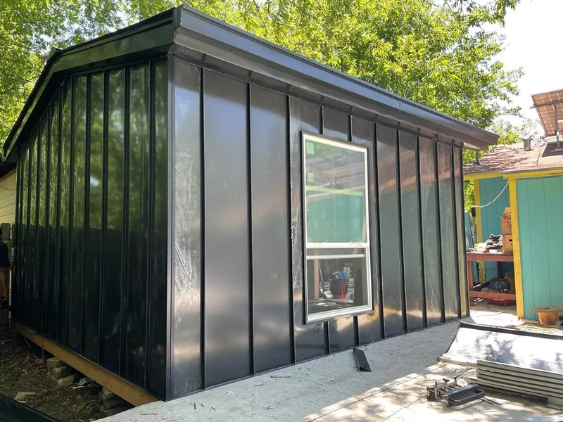 Black standing seam metal wall panels for Metal Roof Installation in Harborcreek