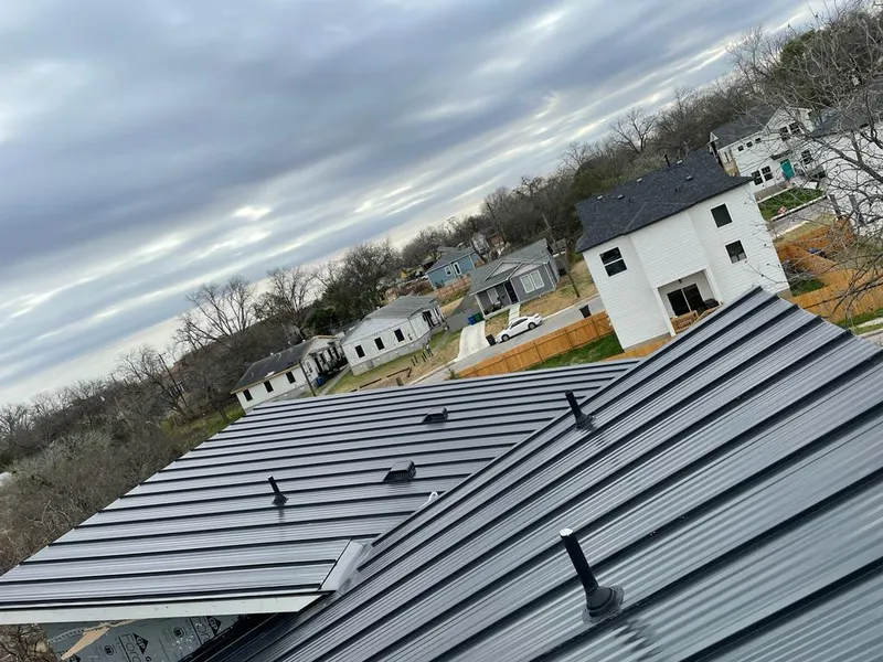 Standing seam metal roof panels with vents for Skylight Repair in Harborcreek